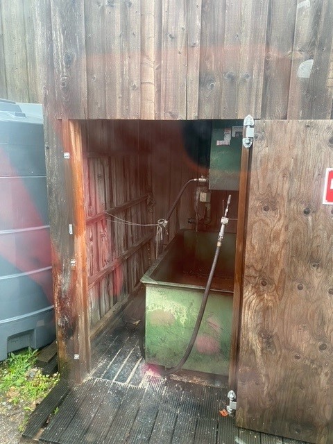 Fuel tank inside a shed.